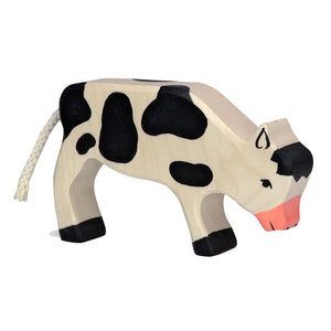 Calf, grazing, black