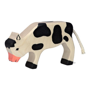 Calf, grazing, black